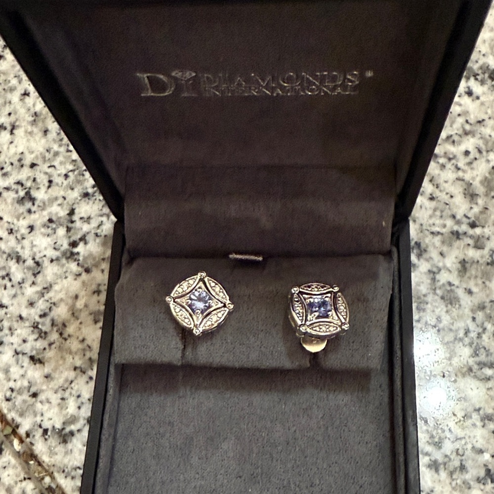 Diamonds International Silver and Tanzanite.  Day to night.  Stud to Dangle.